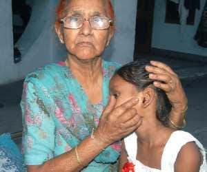 teacher beat girl in classroom.