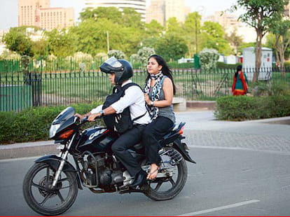 Why are women in Delhi helmet cut short?