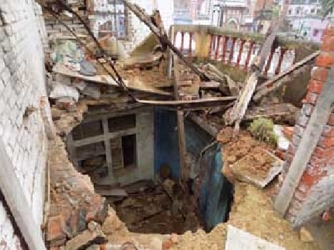 Shabby flat roof falls , couple injured