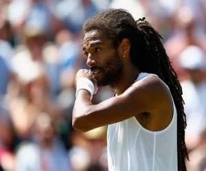 dustin brown is out in wimbledon 2015