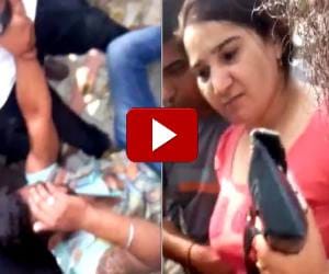 chain snatcher beaten by angry woman on road, video