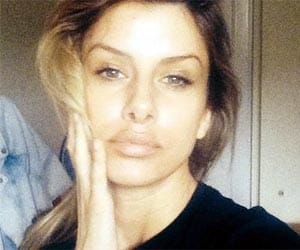 Playboy model linked with 5 MURDERS and multiple robberies