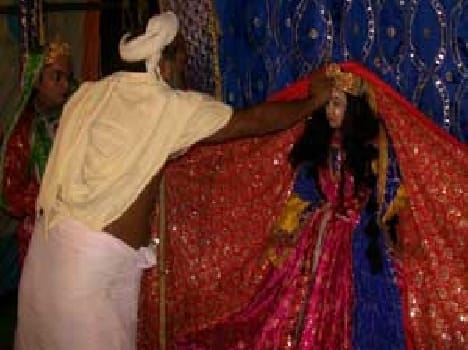 Enchanted by the faithful as a naughty Krishna in Ras