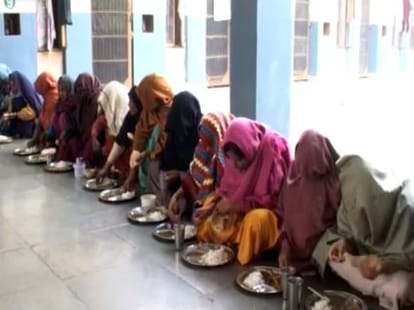With women prisoners in innocent children also in the prison at Tihar.