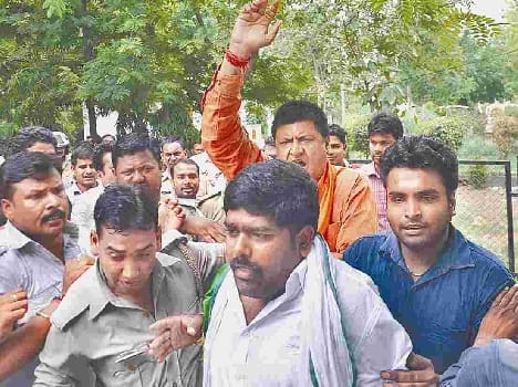 BJP Worker beaten NSUI Worker