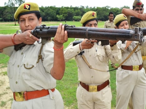 Female police personnel in the firing hand Ajmaa