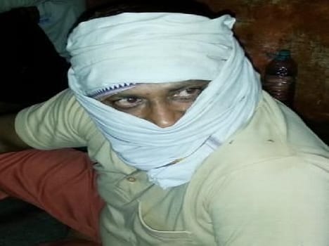 murder victim policeman arrested