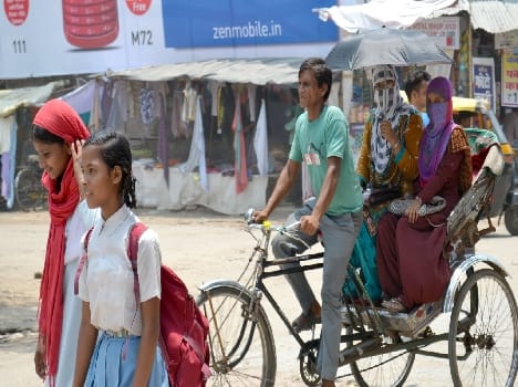 After the rain , people suffering from hot sun and humid heat