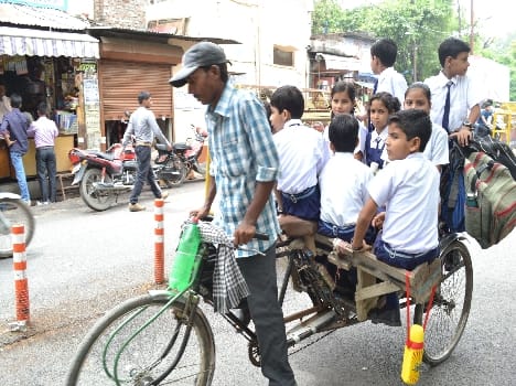 Rickshaw drivers are the lives of children frolic