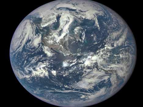 first pic of earth in sun's light drenched 