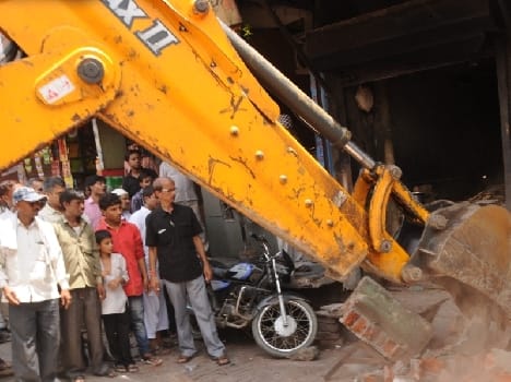 Sidewalk encroachment freed, 