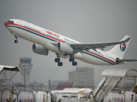 passenger tries to make fire in china plane, caught red handed.