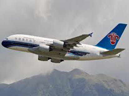 passenger tries to make fire in china plane, caught red handed.