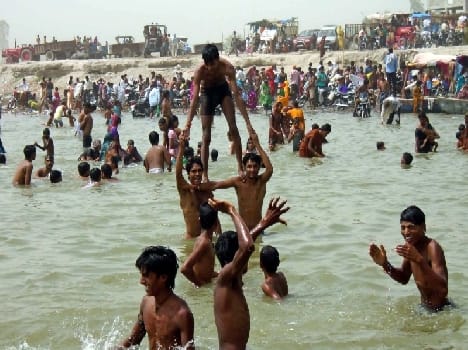 occasion of guru purnima devotes swim in ganga
