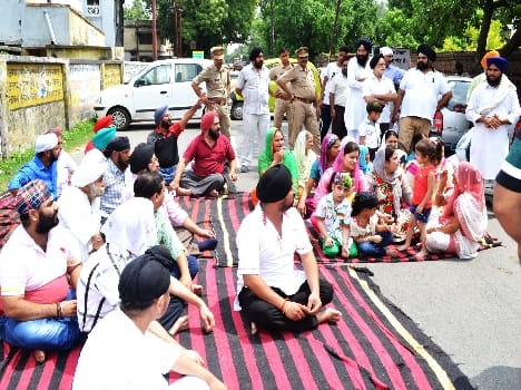 Sikh Sangat wall of the demolished school teacher MLA