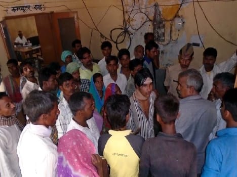 Villagers perform at the SP office