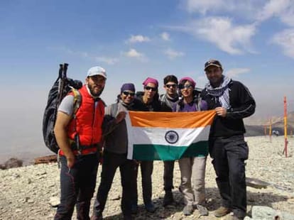 how toolika reached to the highest volcano of asia