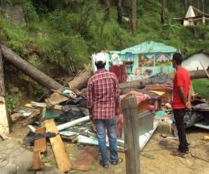 house demolished, mother and son died.