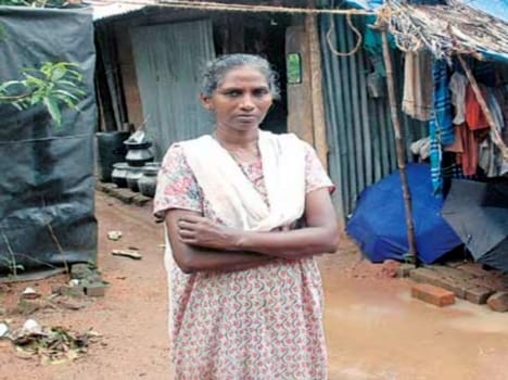 A mother goes door to door for kerosene