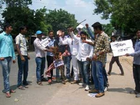 Students blew effigy of terrorism , protesting