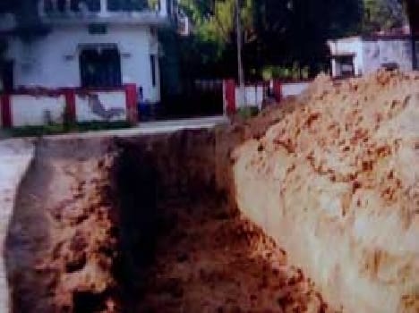 Strip pit dug in front of the house
