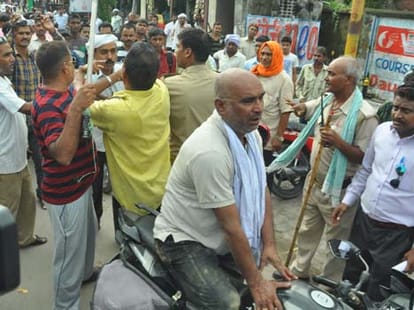 person beaten by mother and daughter