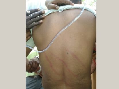 A businessman beaten by Police men.