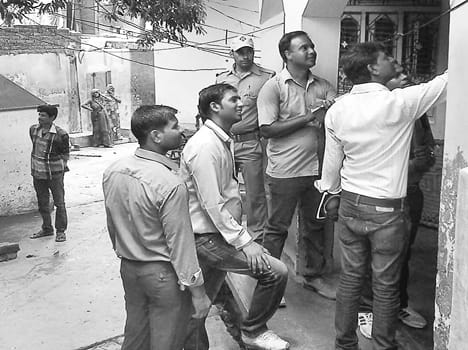 The team found three phase electrical workers checking the house