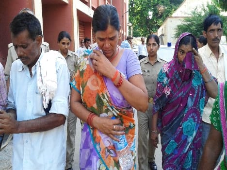 Sentencing hearing Sakhi head bowed