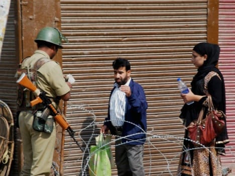 Protesters clash with security personnel in Srinagar