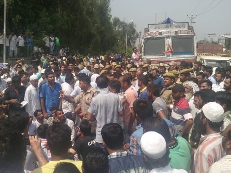 furore over religious books ?found in junk warehouse in jammu