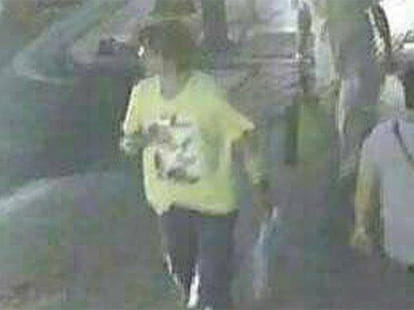 police have released two images of the bomb attack suspect