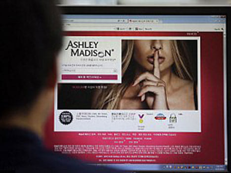 Millions of suspicious spouses crash websites set up to find names of Ashley Madison 'cheaters'