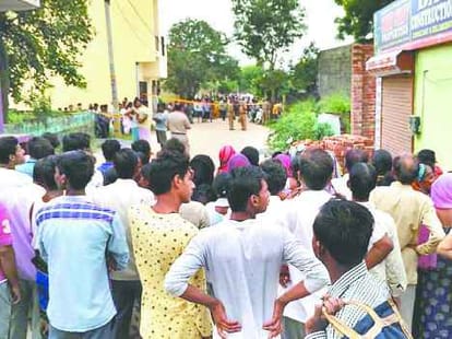 lady body found near housein half naked condition
