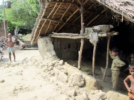 Wall and roof collapsed , killing two people