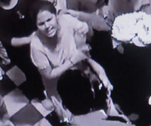 lady slap gaurd of temple for hitting child