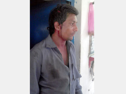 gateman beaten by police
