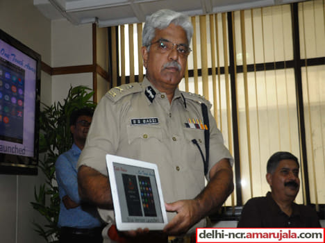 The police and the public is low in the distance, now 'One Touch Away' security