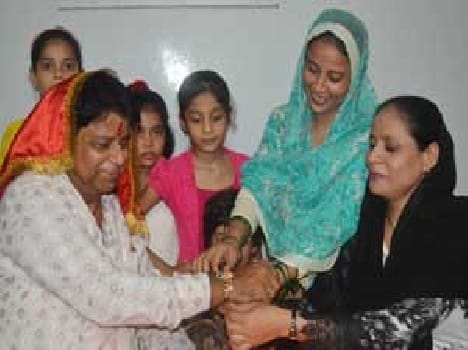 Sisters tie Rakhi