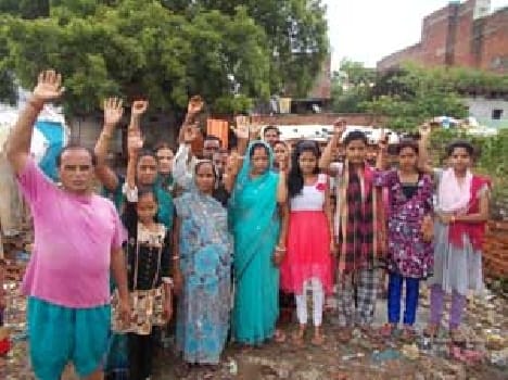 Garbage thrown inundated way, life difficult