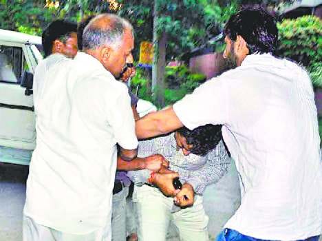 relative of minister pa string up pistol on policeman
