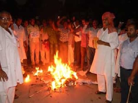 Teachers Burnt effigies of the new pension scheme