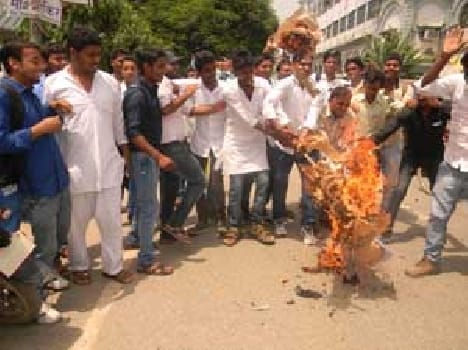 College students burned effigies of administration