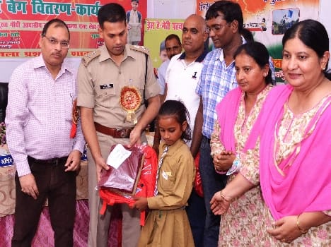 Medhavion the SP distributed school bags