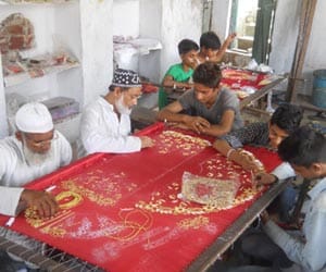 muslim persons are making dress for janmashtami festival