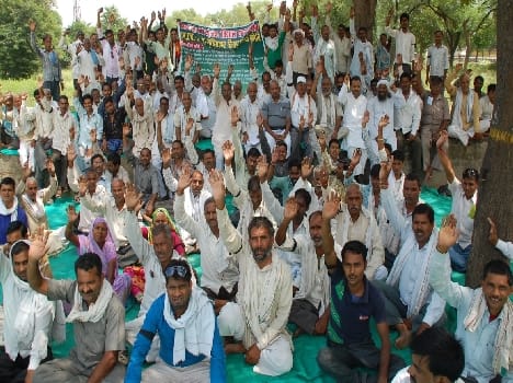 Four times the compensation for farmers shout