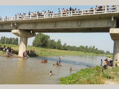 Two drown in Sai river.