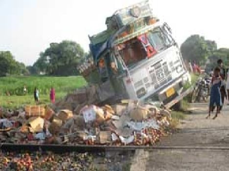Workers on the truck hit the open crossing express