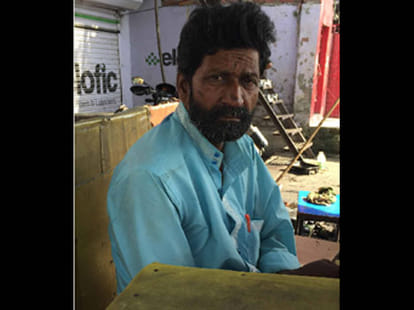 She was crying from inside the police station that police hit her husband