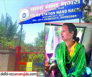 She was crying from inside the police station that police hit her husband